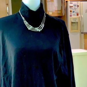 Three strand costume jewelry necklace silver and sparkle design